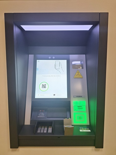 Centrala obraz przedstawia bankomat
